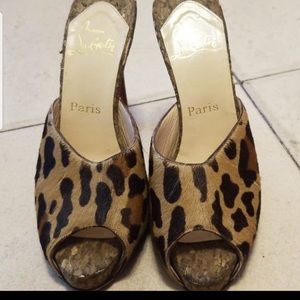 Christian Louboutin peep toe leopard slip ons